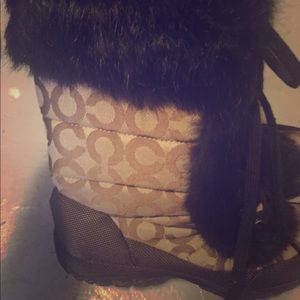 Coach boots with fur.  Used once size 7,5